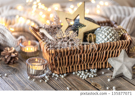 Christmas decorations in a basket. Composition with Christmas decorations. Christmas decorations in a basket. Composition with Christmas decorations. 135877071