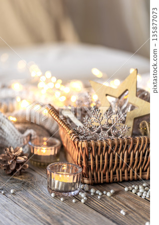 Christmas decorations in a basket. Composition with Christmas decorations. 135877073