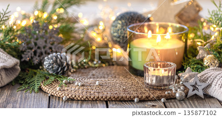 Cozy Christmas composition. Christmas candle. 135877102