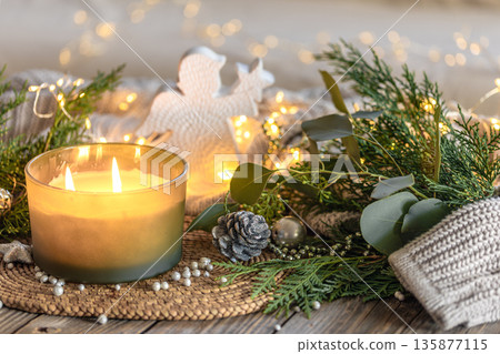 Cozy Christmas composition. Christmas candle. 135877115