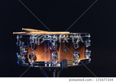 Drum close-up. Drumsticks with a drum. 135877204