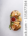 Ground turkey and cheddar quesadillas with salsa 135877364
