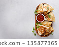 Ground turkey and cheddar quesadillas with salsa 135877365