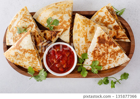 Ground turkey and cheddar quesadillas with salsa Ground turkey and cheddar quesadillas with salsa 135877366