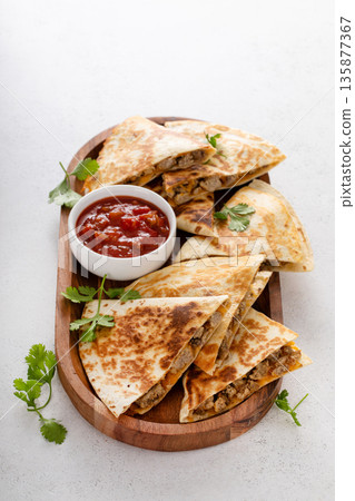 Ground turkey and cheddar quesadillas with salsa Ground turkey and cheddar quesadillas with salsa 135877367