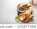 Ground turkey and cheddar quesadillas with salsa 135877368