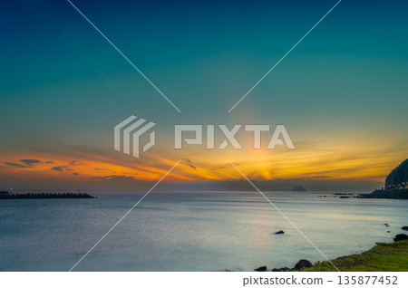 Serene Sunrise at Keelung Islet from Waishuangxi, Taiwan. Serene Sunrise at Keelung Islet from Waishuangxi, Taiwan. 135877452
