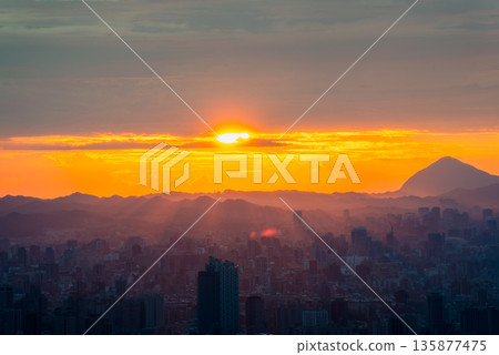 Breathtaking Sunrise Over Taipei City from Dadao Mountain, Shulin, Taiwan. 135877475