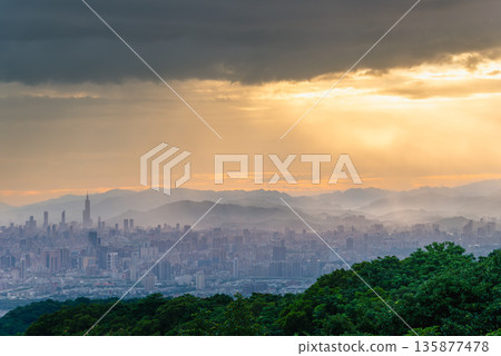 Dramatic Crepuscular Rays Shine Over Taipei City from Dadao Mountain. Dramatic Crepuscular Rays Shine Over Taipei City from Dadao Mountain. 135877478