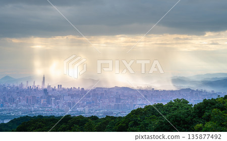 Dramatic Rain and Light over Taipei from Shulin Dadao Mountain. Dramatic Rain and Light over Taipei from Shulin Dadao Mountain. 135877492