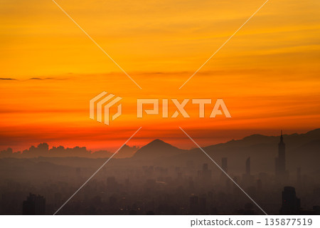 Misty Dawn Silhouette of Mountains from Dadao Mountain Shulin Taiwan. Misty Dawn Silhouette of Mountains from Dadao Mountain Shulin Taiwan. 135877519