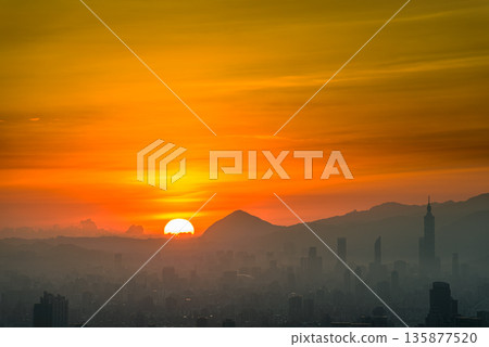 Taiwan Dadao Mountain Sunrise Vivid Orange Sky Mountain Silhouette Hazy. 135877520