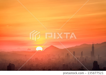 Taiwan Dadao Mountain Sunrise Vivid Orange Sky Mountain Silhouette Hazy. 135877521