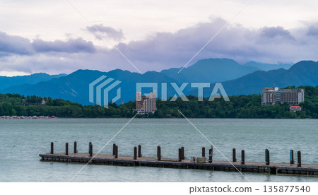 Rolling Waves and Moving Clouds Over Sun Moon Lake in Yuchi Township Taiwan. Rolling Waves and Moving Clouds Over Sun Moon Lake in Yuchi Township Taiwan. 135877540