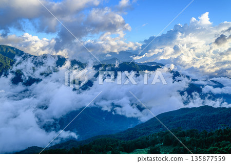 Rolling Clouds Over Mountain Hehuan Forest in Nantou Taiwan. Rolling Clouds Over Mountain Hehuan Forest in Nantou Taiwan. 135877559