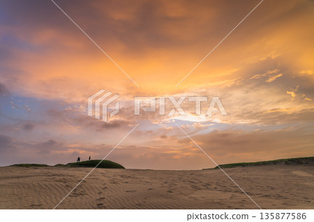 Sunset Over Dintouer Sandbank in Qigu Tainan Taiwan. Sunset Over Dintouer Sandbank in Qigu Tainan Taiwan. 135877586