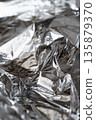 Light airy metallic foil texture with soft reflective highlights 135879370