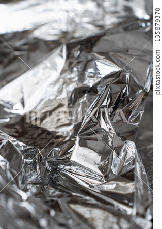 Light airy metallic foil texture with soft reflective highlights 135879370