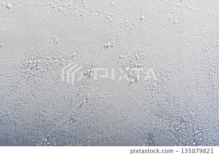 Water drops on a white background Water drops on a white background 135879821