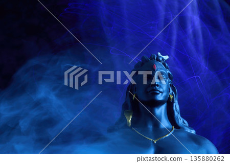 Maha Shivratri background. Lord shiva adiyogi meditating in divine blue light Maha Shivratri background. Lord shiva adiyogi meditating in divine blue light 135880262