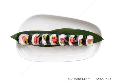 Top view of tuna maki sushi roll with salmon roe and green onion 135880673