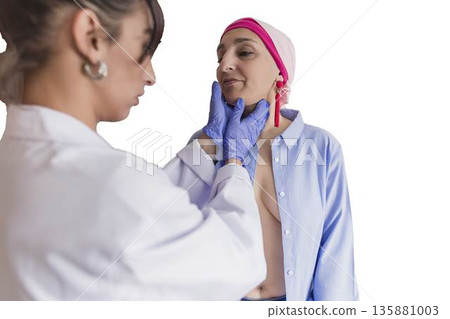 Doctor examining patient's neck for cancer detection Doctor examining patient's neck for cancer detection 135881003