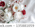 Flowers in a bouquet on a white background showcasing different colors and shapes 135881059