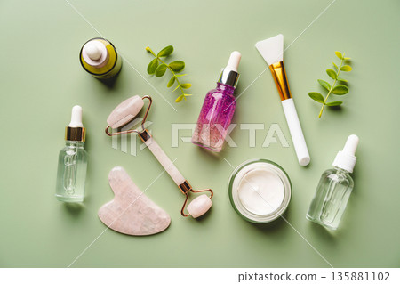Jade face rollers and Gua sha stones 135881102