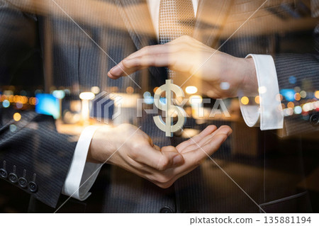 Businessman holds money symbol. Businessman holds money symbol. 135881194