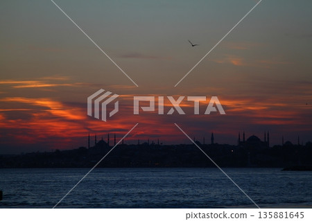 sunset in istanbul, metropolitan city and silhouette of the city sunset in istanbul, metropolitan city and silhouette of the city 135881645