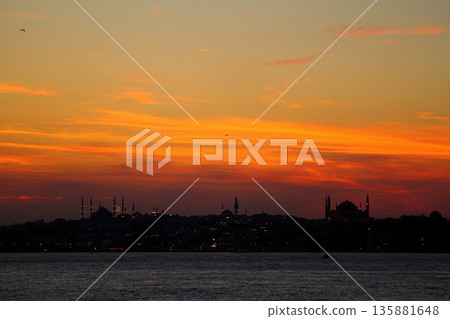 sunset in istanbul, metropolitan city and silhouette of the city sunset in istanbul, metropolitan city and silhouette of the city 135881648