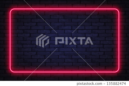 Vibrant red neon frame glowing on a dark brick wall. The stylish contrast gives a modern, nightlife-inspired atmosphere perfect for ads and digital projects. 135882474