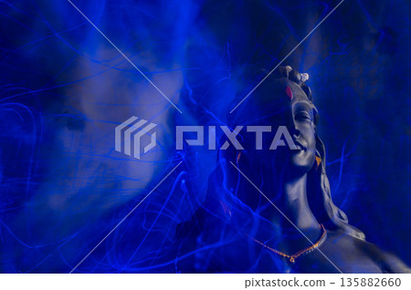 Maha Shivratri, Lord Shiva on blue, colorful mistic trance background. 135882660