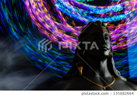 Maha Shivratri, Lord Shiva on blue, colorful mistic trance background. Maha Shivratri, Lord Shiva on blue, colorful mistic trance background. 135882664