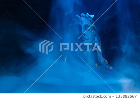 Maha Shivratri, Lord Shiva on blue, colorful mistic trance background. Maha Shivratri, Lord Shiva on blue, colorful mistic trance background. 135882667