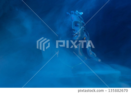 Maha Shivratri, Lord Shiva on blue, colorful mistic trance background. 135882670