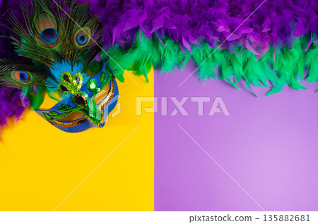 Vibrant Mardi Gras background with mask, beads, and festive decorations Vibrant Mardi Gras background with mask, beads, and festive decorations 135882681