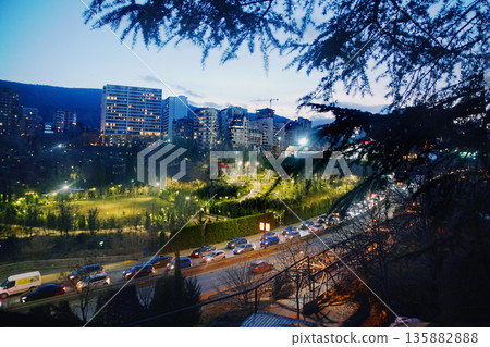 Chabua Amirejibi road with traffic to centre (to Heroe's Square) in  Tbilisi  in twilight 135882888