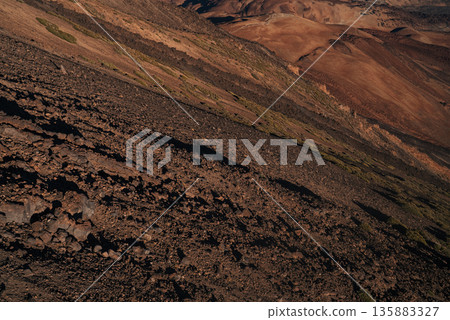 Volcanic Surface of Mount Teide, Sparse High Altitude Vegetation, Canary Island Volcanic Surface of Mount Teide, Sparse High Altitude Vegetation, Canary Island 135883327