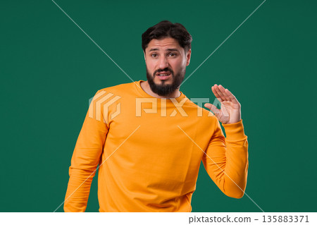 Irritated Bearded handsome man Showing Bla-Bla Gesture With Hands, Rolling Eyes 135883371