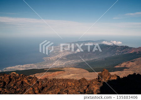 City and Atlantic Ocean View from Mount Teide Volcano in South Tenerife, Spain City and Atlantic Ocean View from Mount Teide Volcano in South Tenerife, Spain 135883406
