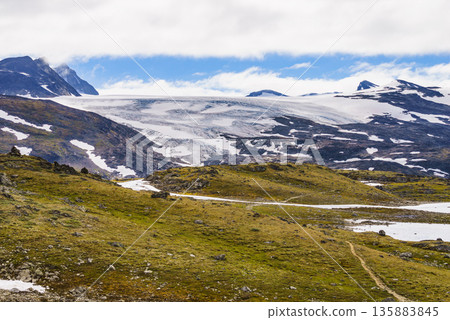 Mountains with ice glacier. Road Sognefjellet, Norway Mountains with ice glacier. Road Sognefjellet, Norway 135883845
