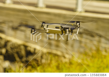 Drone flying against nature Drone flying against nature 135883864
