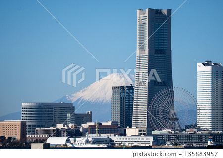Minato Mirai cityscape and Mt. Fuji shining against the blue sky 135883957