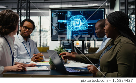 AI company female entrepreneur shaking hand with businessperson. Startup boss greeting angel investor, agreeing to artificial intelligence technology consultancy deal, camera A 135884427