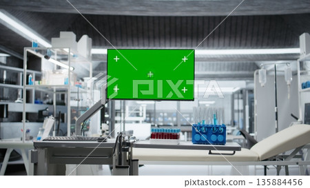 Chroma key screen in empty laboratory with sterile equipment, digital monitors and microscopes ready for testing and experimentation. Biotechnology research driving healthcare innovation. 135884456
