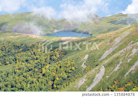 Hakuba Oike Pond seen from the summit of Mount Korenge. Hakuba Oike Pond - Hakuba-dake Traverse in the Northern Alps Hakuba Oike Pond seen from the summit of Mount Korenge. Hakuba Oike Pond - Hakuba-dake Traverse in the Northern Alps 135884878