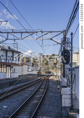 Kawana Station: Tracks and signals seen from the platform. Local line station scenery. 135885594