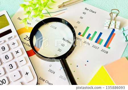 Work graph document, magnifying glass and calculator Work graph document, magnifying glass and calculator 135886093