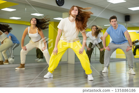Teen girl dancing modern dances in dance studio 135886186